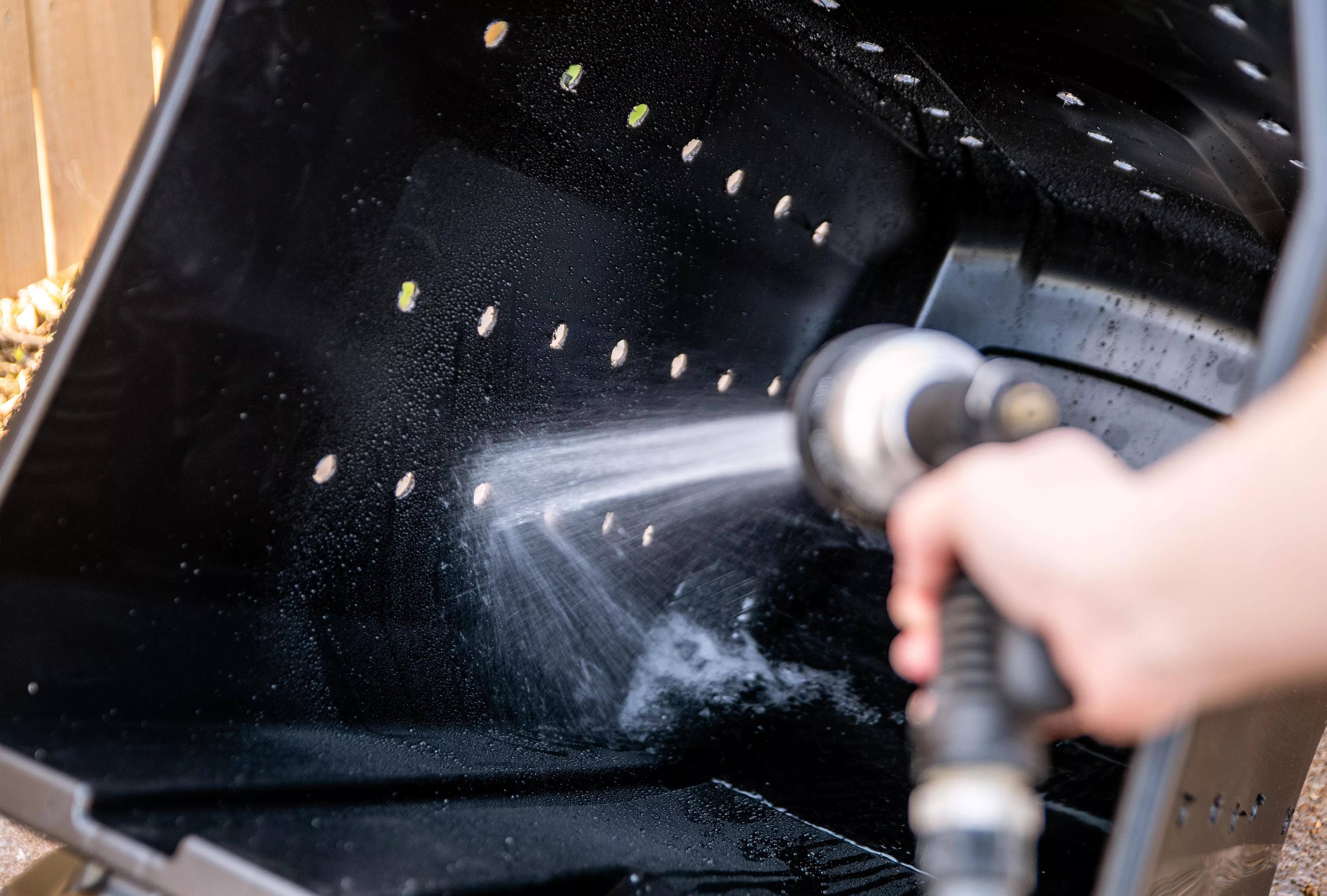 thoroughly rinsing off bin