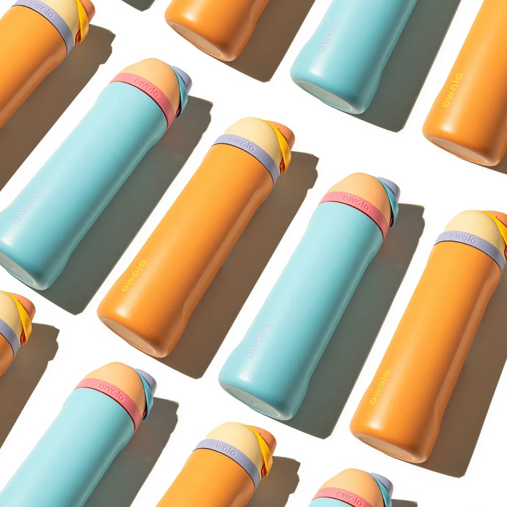 bright blue and orange owala bottles against a white background