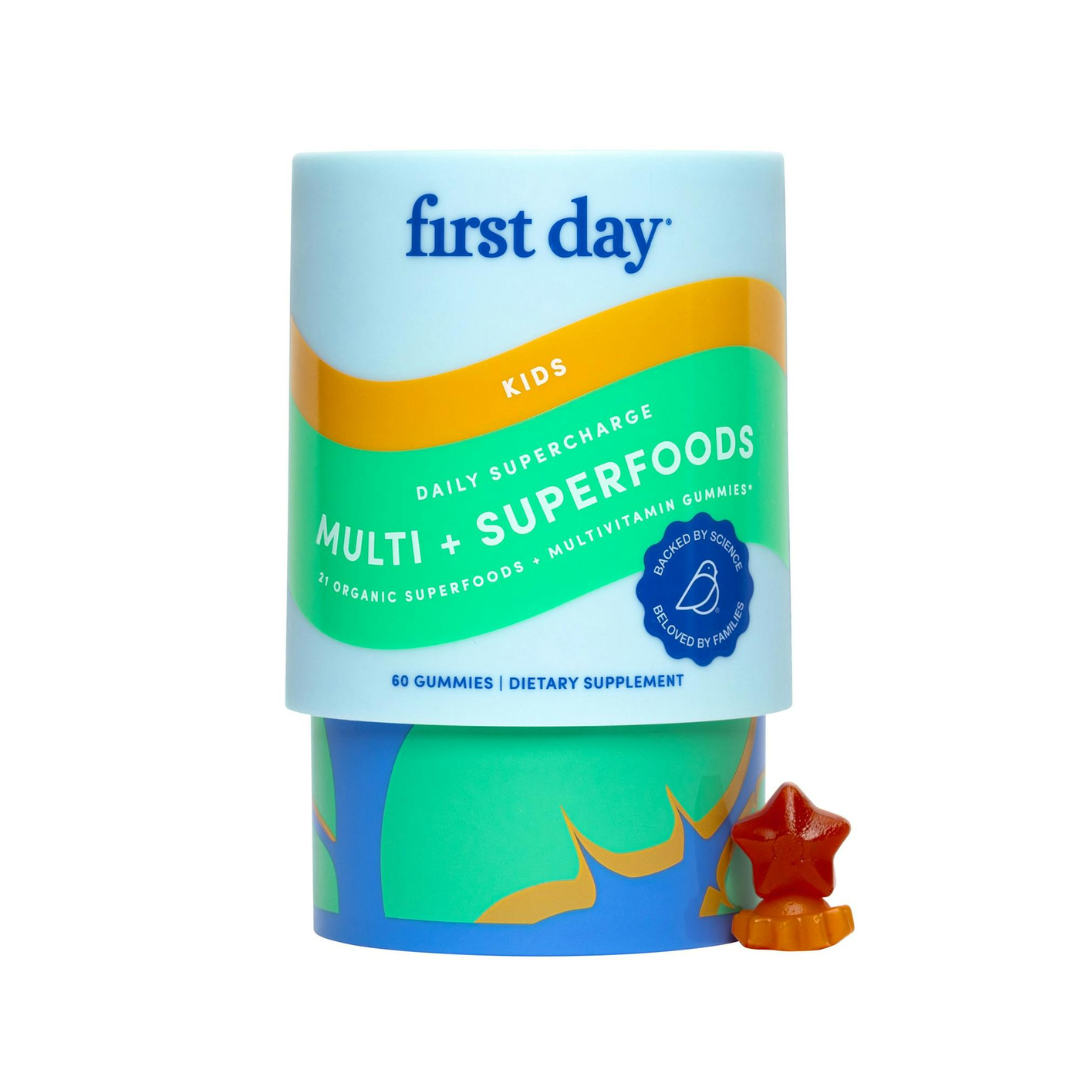 Multivitamin gummy container with 'first day' branding on a white background