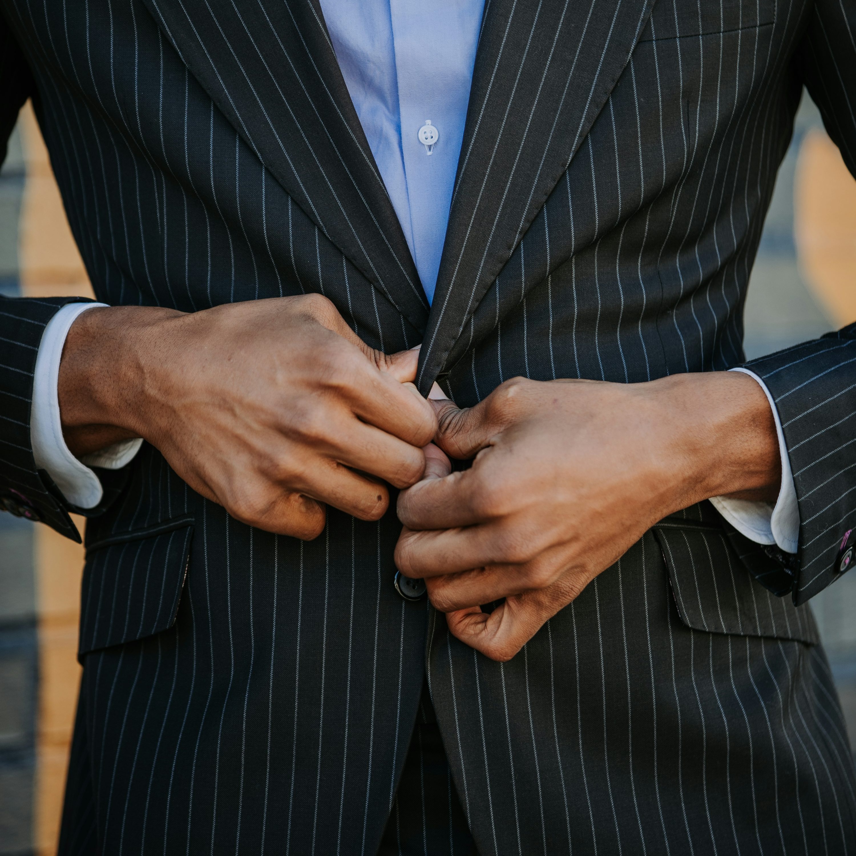 man wearing balck suit jacket