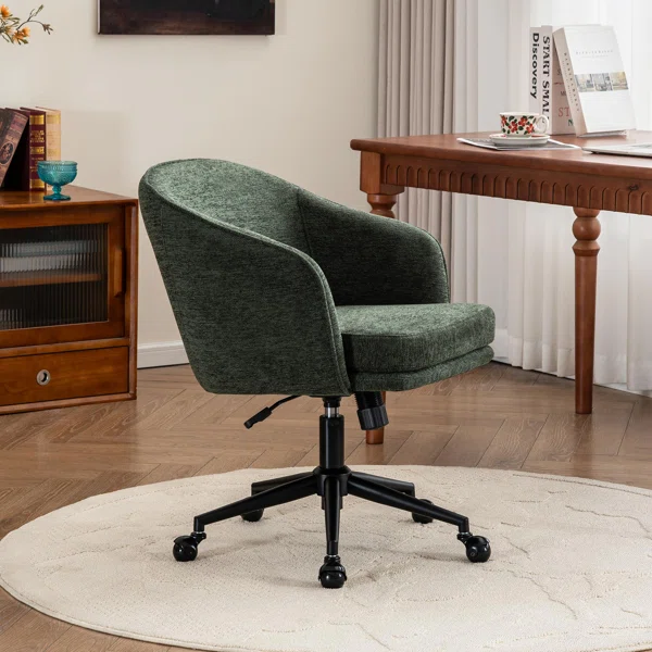 Green upholstered office chair on a round rug in a home office