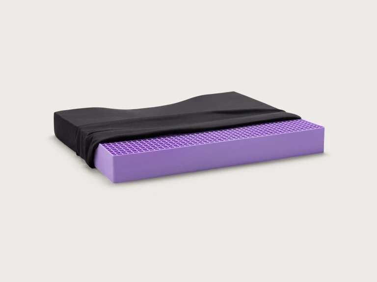 Purple gel seat cushion with black cover partially removed