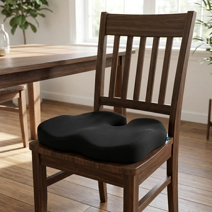 Everlasting Comfort Elevate Series Cushion on a wooden chair in a sunlit room