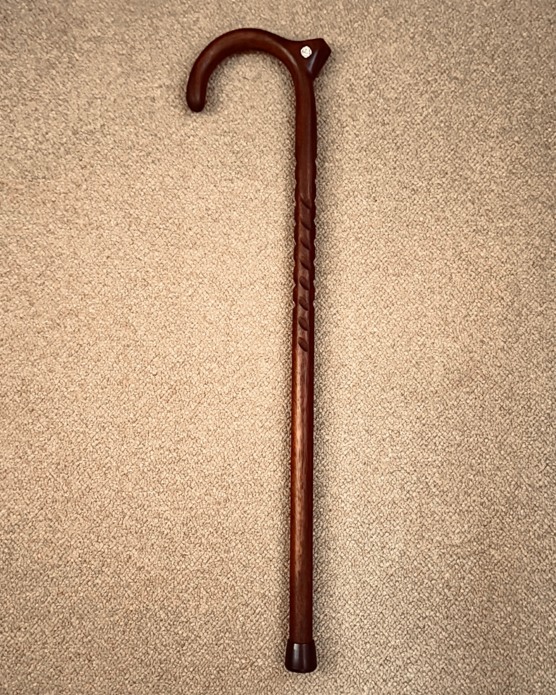 Custom hickory hardwood cane with round horn, Swarovski&reg; crystal on palm rest, and rumble strips for protection
