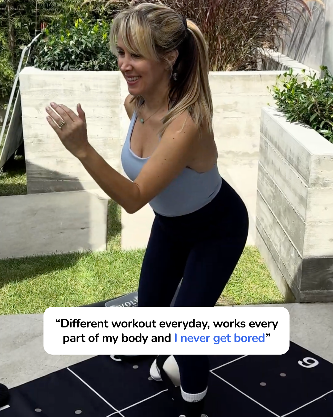 Woman exercising outdoors on a PVOLVE mat