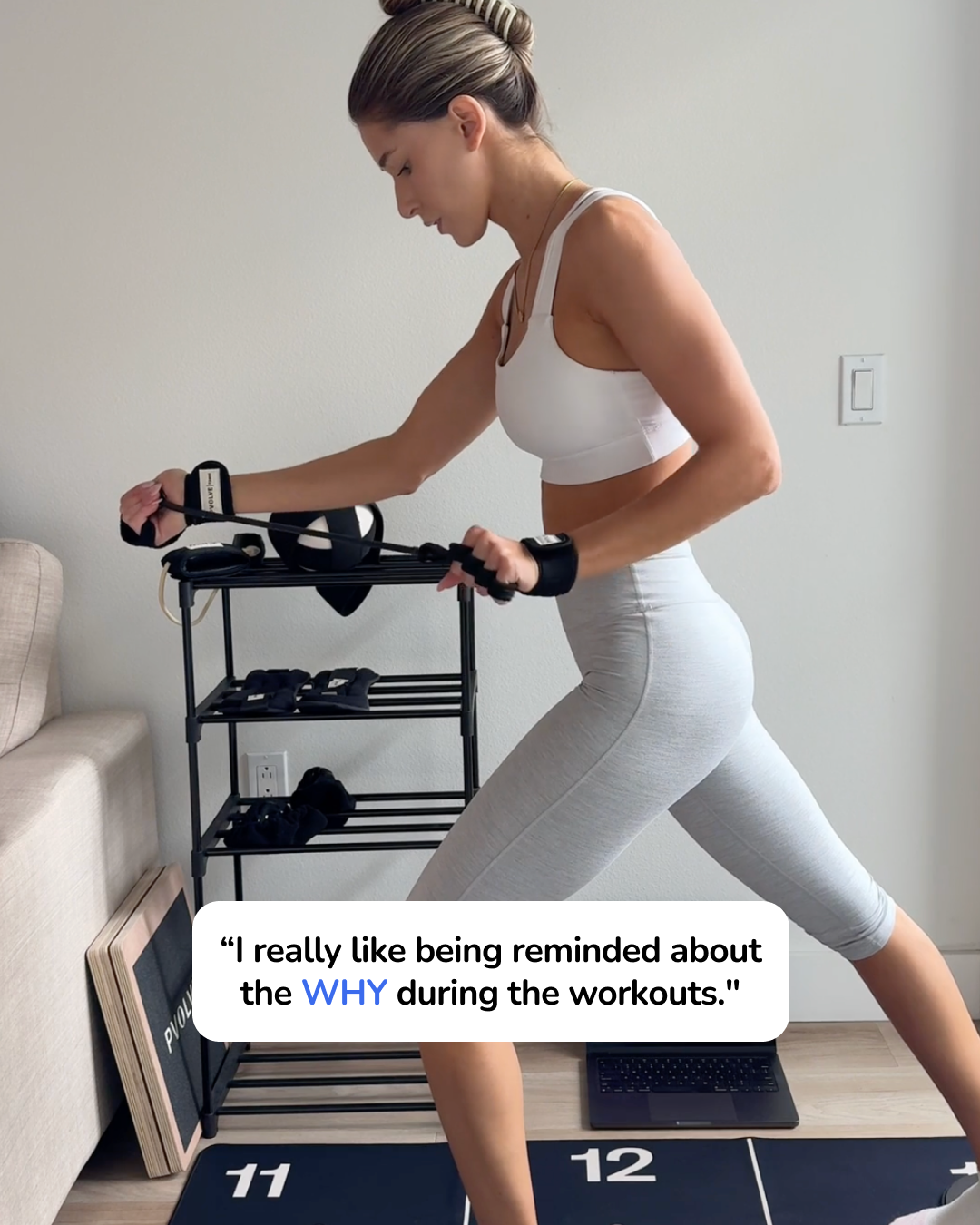 Woman exercising with PVOLVE resistance bands at home