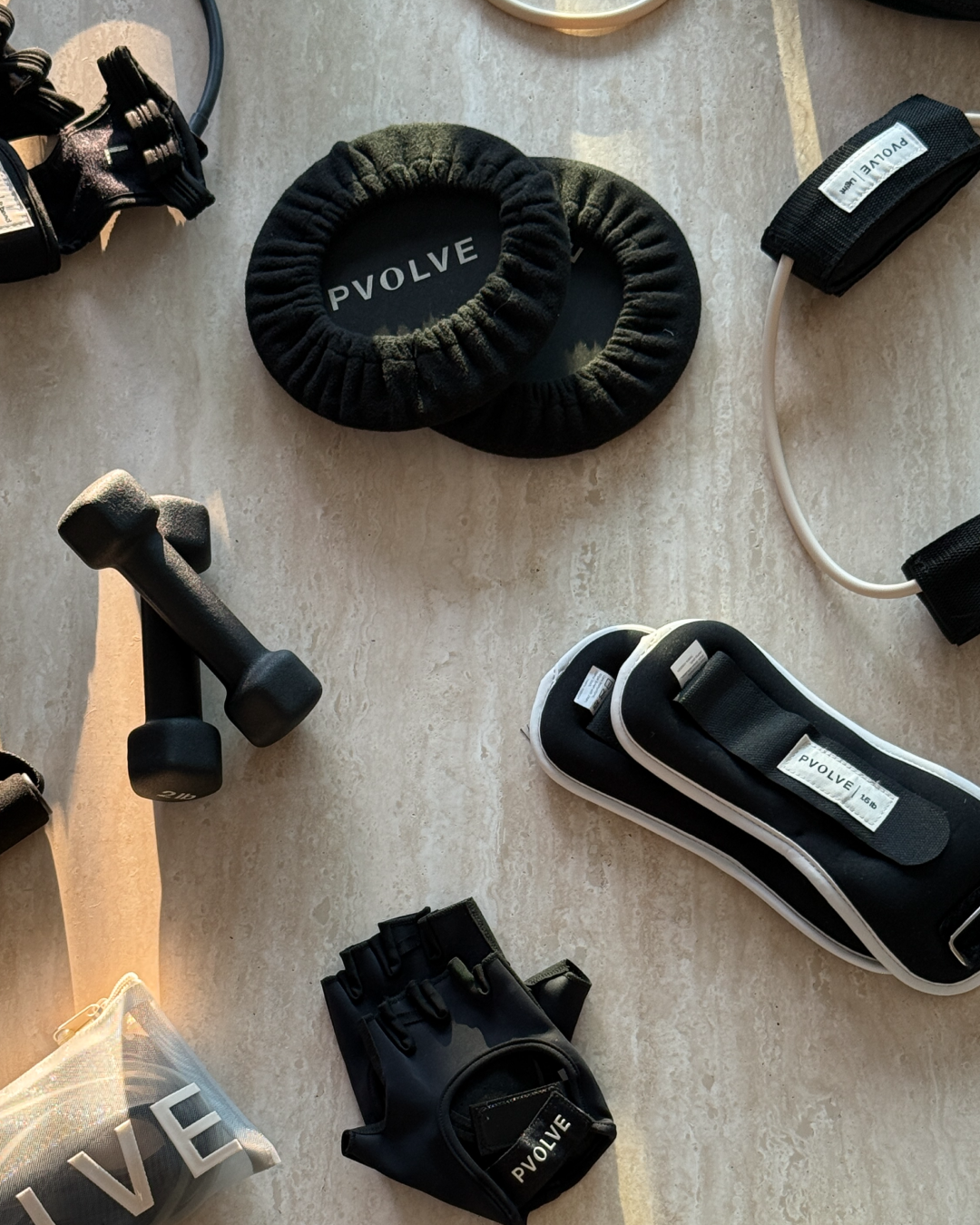 An assortment of PVOLVE workout gear