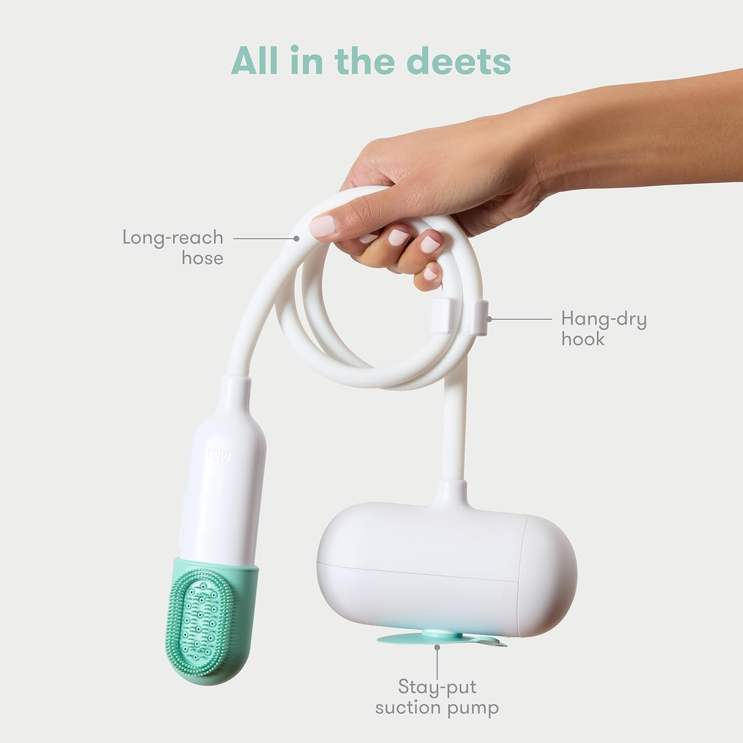 Details of the Control the Flow Bath Sprayer, including its long hose, hang-dry hook, and stay-put suction pump