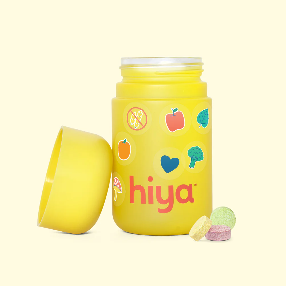 Hiya multivitamin bottle for kids with colorful stickers and tablets