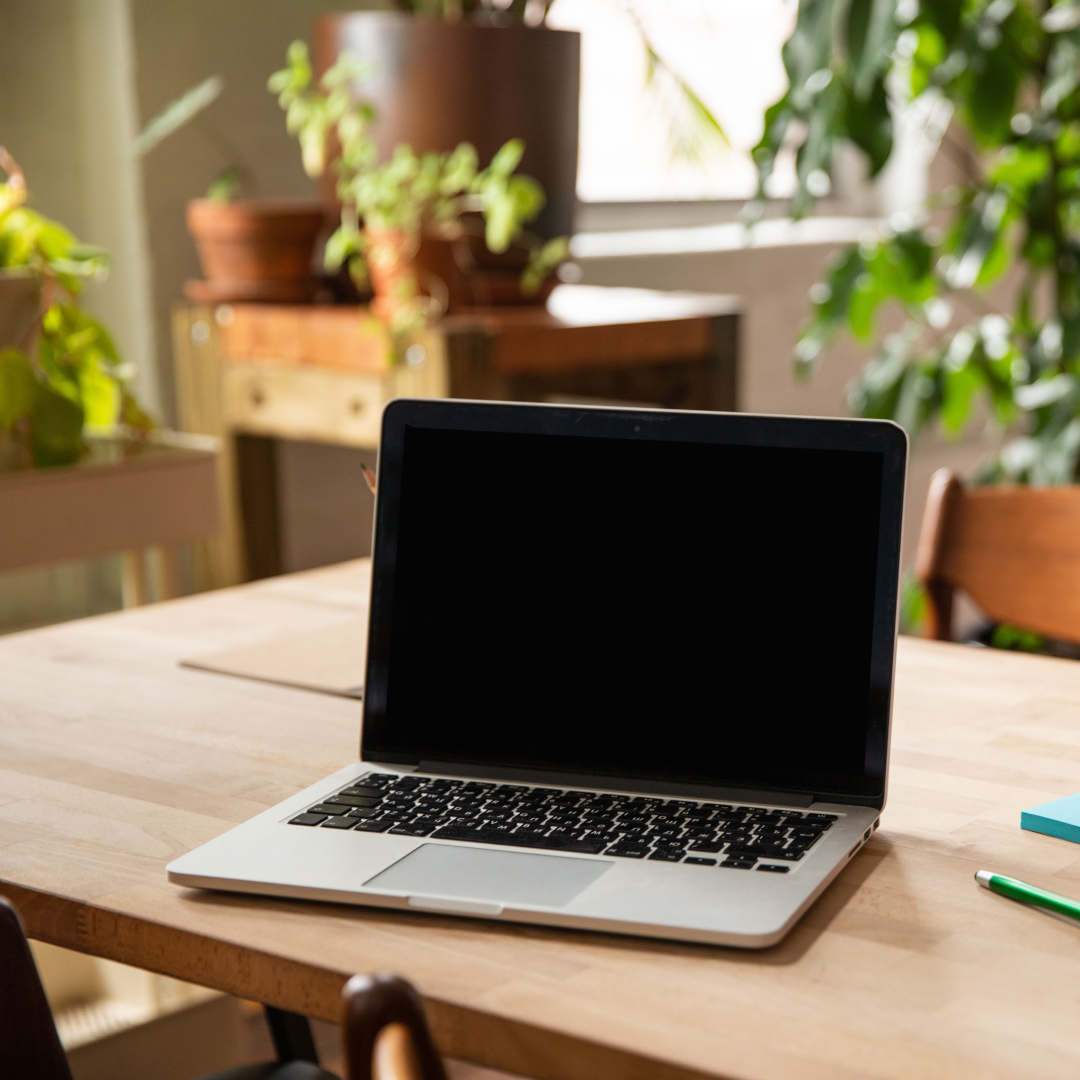 Dining table being used as a makeshift desk