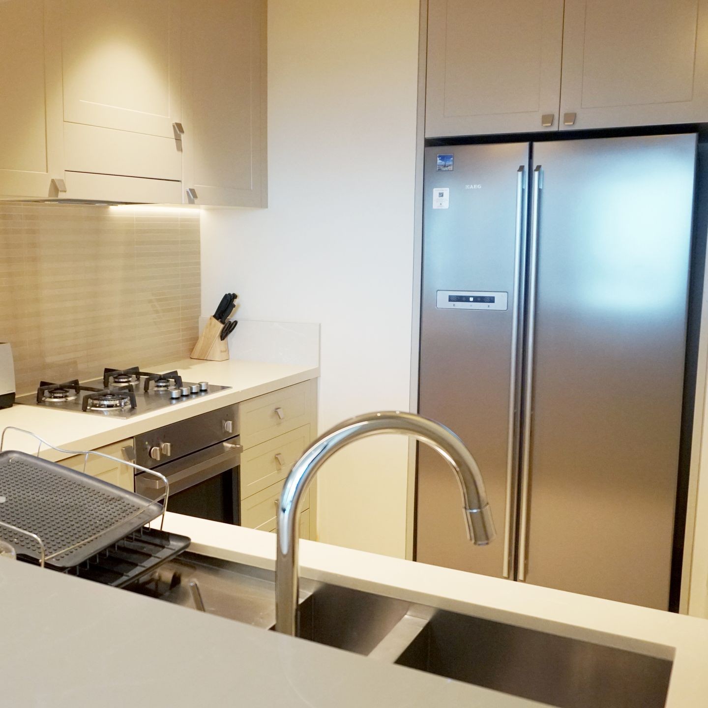 Modern kitchen with stainless steel appliances and efficient layout