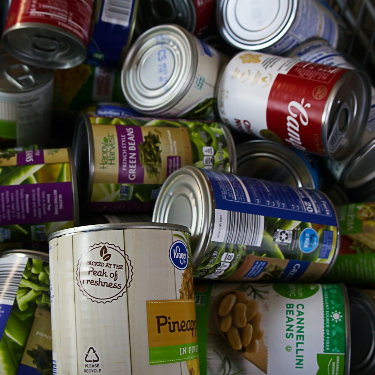 Assorted Canned Goods Various canned goods are stacked together