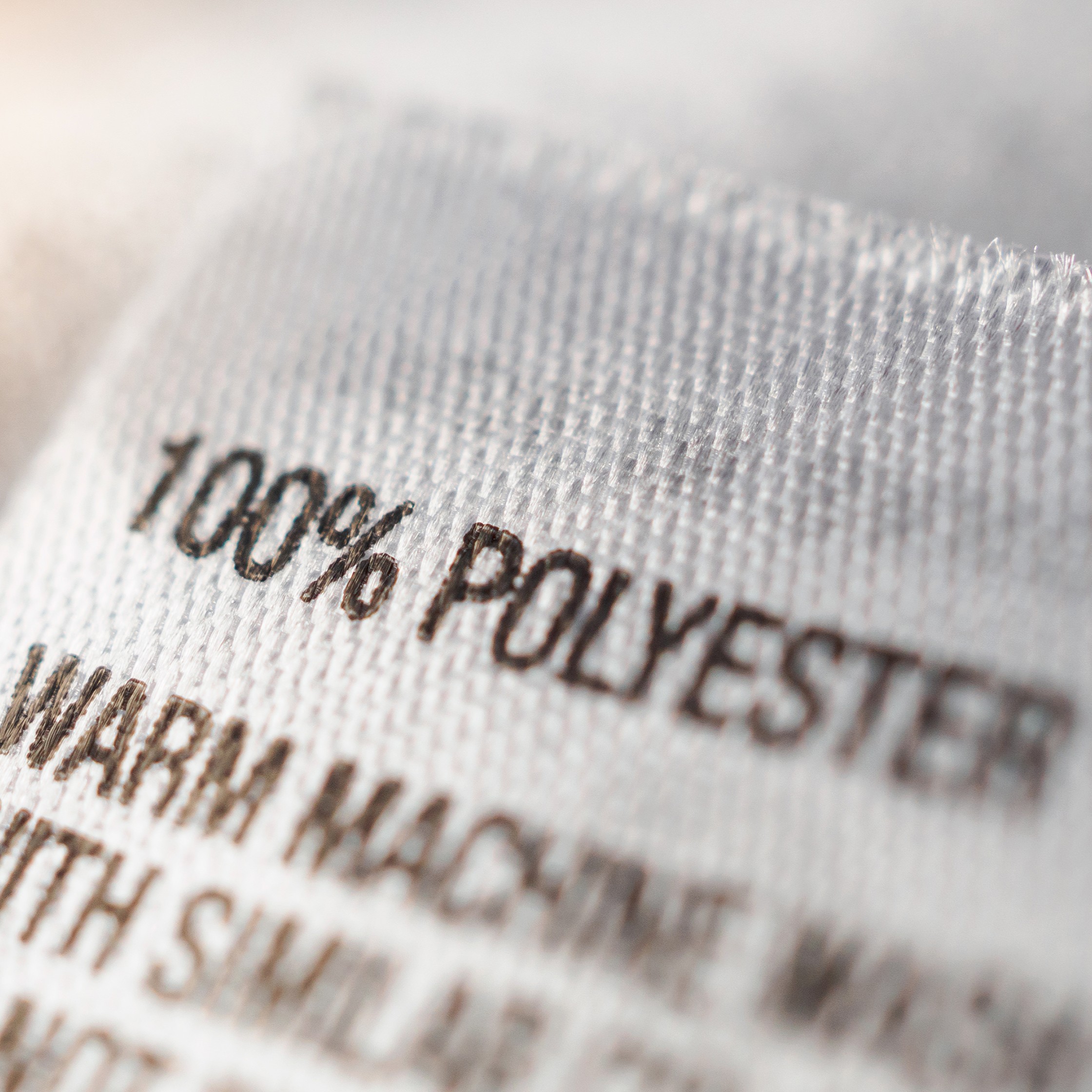 Polyester Material Label Clothing label shows 100% polyester material composition