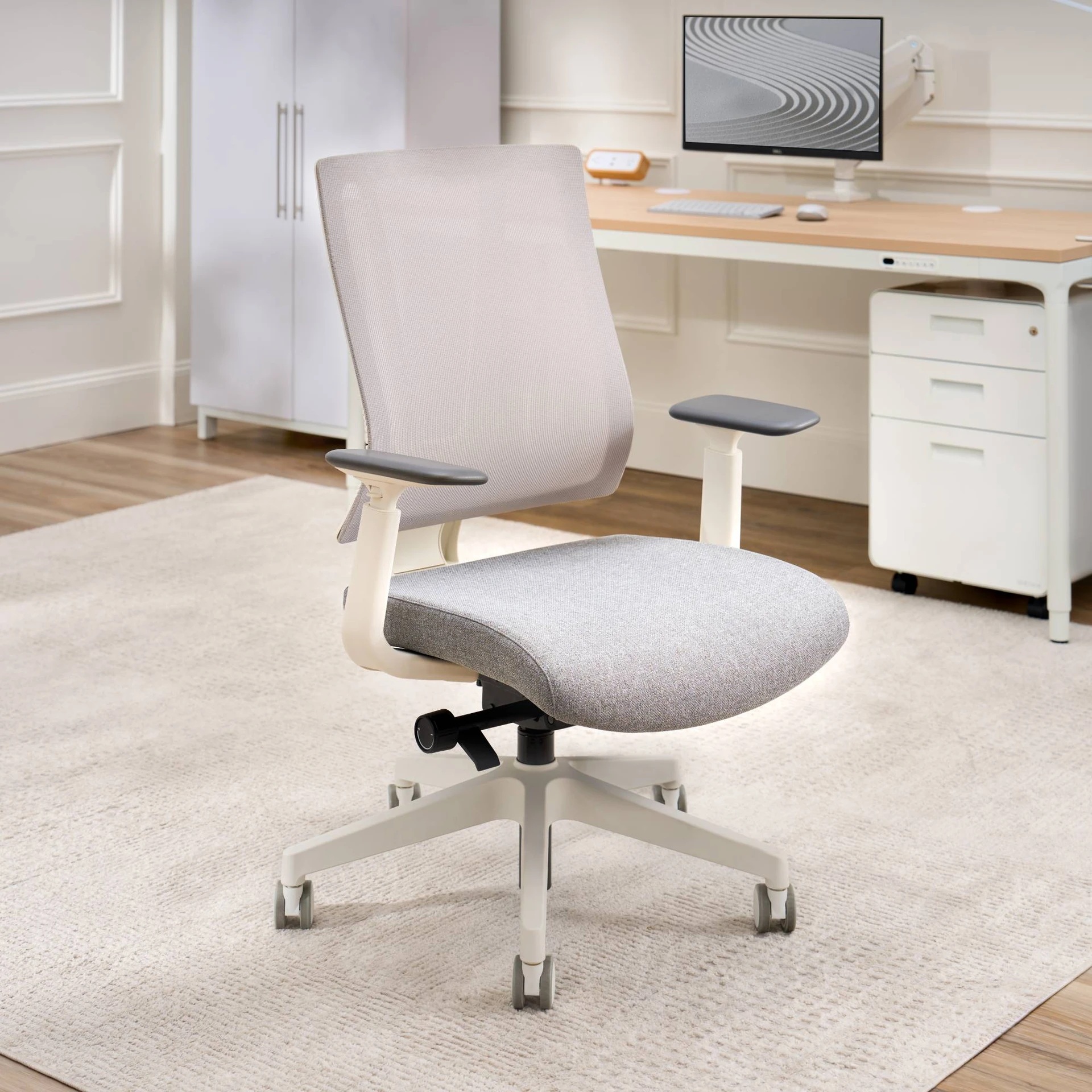 UPLIFT Clarksville in Home Office An UPLIFT Clarksville mesh ergonomic chair is positioned in a modern home office setting