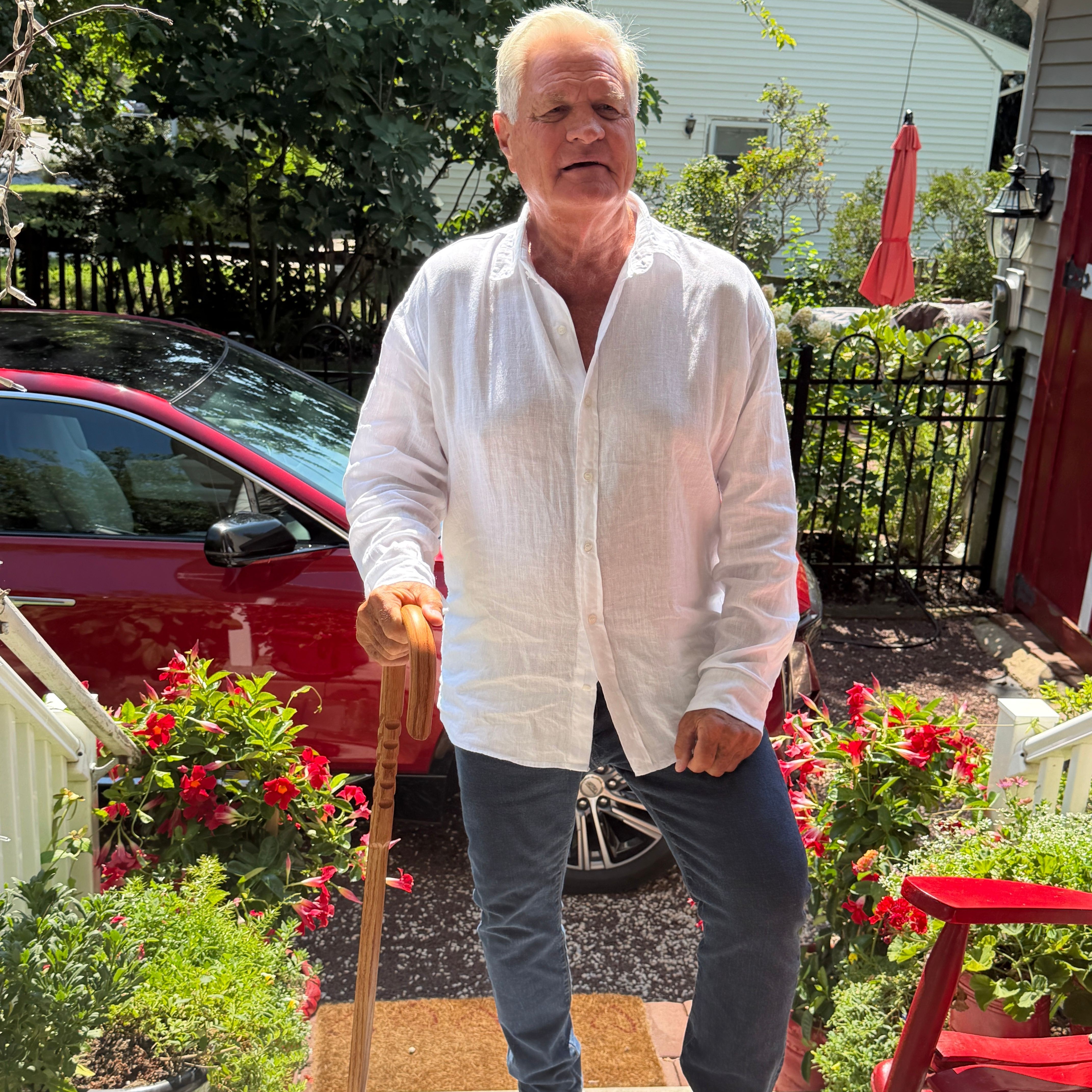 Parker with Pure Hickory Cane Outdoors Parker walking up the stairs of his front porch with his Cane Masters pure hickory cane