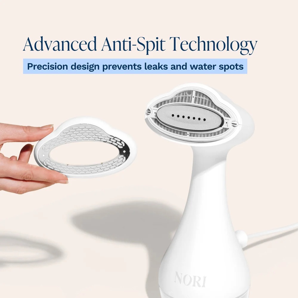 Hand holds a component of the Nori Cloud Max with anti-spit technology