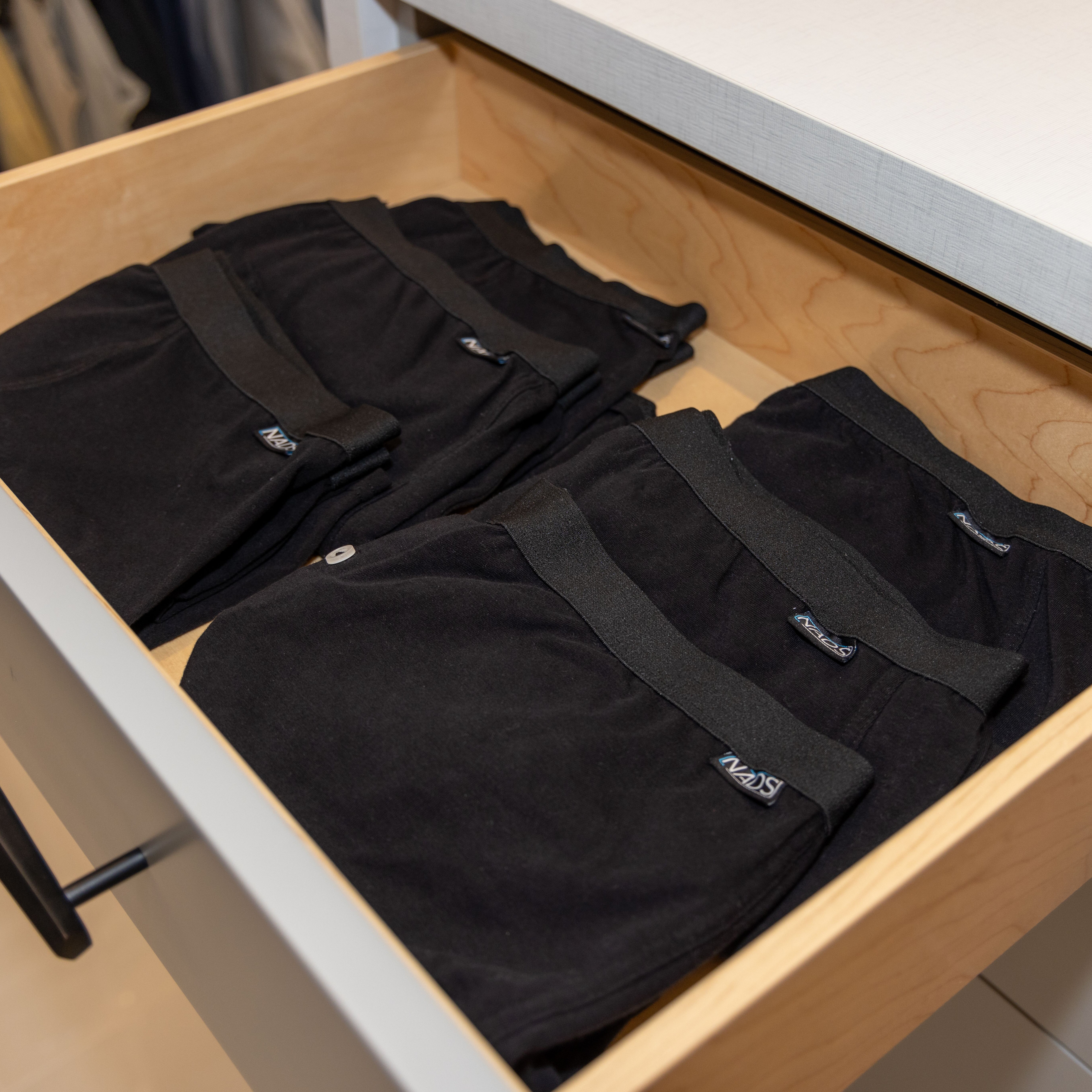 Neatly Organized NADS Organic Cotton Boxers A drawer neatly organized with NADS black Organic Cotton Boxers